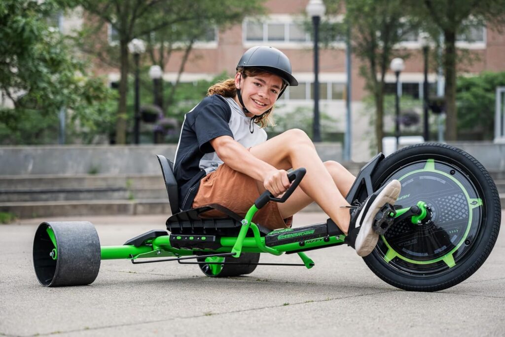 3. Huffy Green Machine 20-inch Drift Trike Kids Bike with Training Wheels.